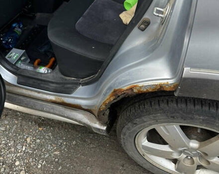 Серый Мицубиси Аутлендер, объемом двигателя 2 л и пробегом 288 тыс. км за 4300 $, фото 6 на Automoto.ua