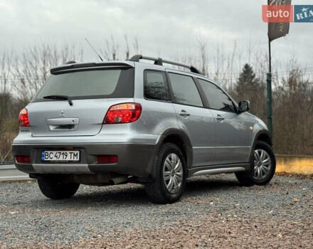 Серый Мицубиси Аутлендер, объемом двигателя 2.38 л и пробегом 204 тыс. км за 6990 $, фото 37 на Automoto.ua