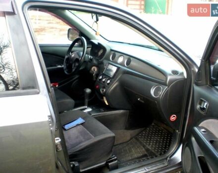 Серый Мицубиси Аутлендер, объемом двигателя 2.4 л и пробегом 235 тыс. км за 6500 $, фото 11 на Automoto.ua