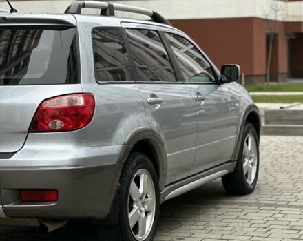 Сірий Міцубісі Аутлендер, об'ємом двигуна 2.4 л та пробігом 98 тис. км за 7199 $, фото 46 на Automoto.ua