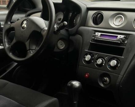 Сірий Міцубісі Аутлендер, об'ємом двигуна 2.4 л та пробігом 98 тис. км за 7199 $, фото 81 на Automoto.ua