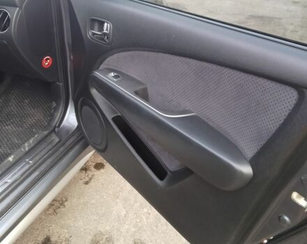 Серый Мицубиси Аутлендер, объемом двигателя 2 л и пробегом 154 тыс. км за 6500 $, фото 8 на Automoto.ua