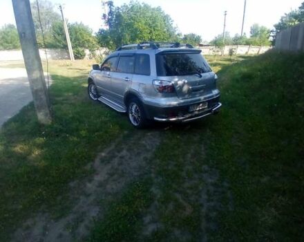 Сірий Міцубісі Аутлендер, об'ємом двигуна 2.38 л та пробігом 226 тис. км за 10000 $, фото 1 на Automoto.ua