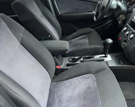 Серый Мицубиси Аутлендер, объемом двигателя 2.38 л и пробегом 180 тыс. км за 6000 $, фото 26 на Automoto.ua