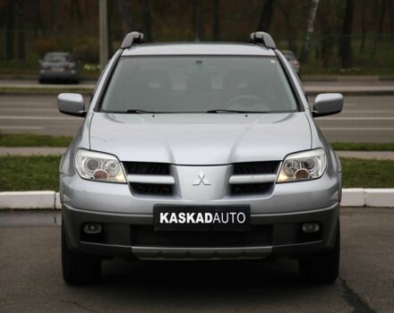 Серый Мицубиси Аутлендер, объемом двигателя 2.4 л и пробегом 171 тыс. км за 8200 $, фото 1 на Automoto.ua