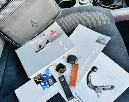 Серый Мицубиси Аутлендер, объемом двигателя 2 л и пробегом 179 тыс. км за 9500 $, фото 23 на Automoto.ua