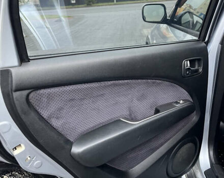 Серый Мицубиси Аутлендер, объемом двигателя 2.38 л и пробегом 180 тыс. км за 6000 $, фото 19 на Automoto.ua