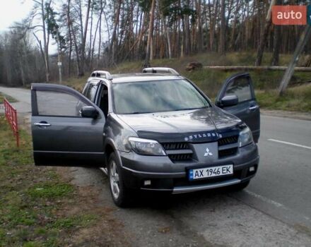 Серый Мицубиси Аутлендер, объемом двигателя 2.4 л и пробегом 235 тыс. км за 6500 $, фото 14 на Automoto.ua
