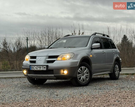 Серый Мицубиси Аутлендер, объемом двигателя 2.38 л и пробегом 204 тыс. км за 6990 $, фото 46 на Automoto.ua