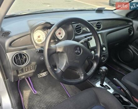 Серый Мицубиси Аутлендер, объемом двигателя 2.4 л и пробегом 243 тыс. км за 6999 $, фото 8 на Automoto.ua