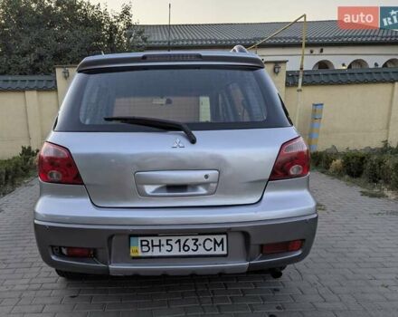 Сірий Міцубісі Аутлендер, об'ємом двигуна 2.38 л та пробігом 137 тис. км за 5500 $, фото 7 на Automoto.ua