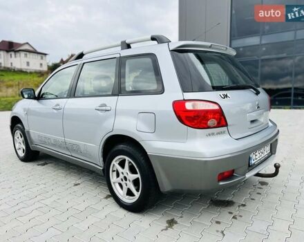 Сірий Міцубісі Аутлендер, об'ємом двигуна 2 л та пробігом 300 тис. км за 5150 $, фото 12 на Automoto.ua