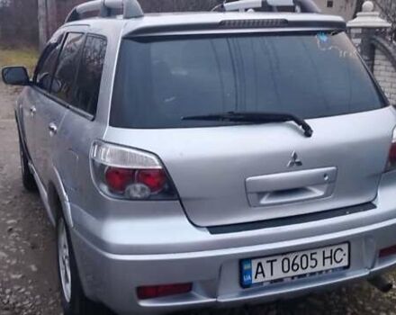 Серый Мицубиси Аутлендер, объемом двигателя 2.4 л и пробегом 261 тыс. км за 5700 $, фото 28 на Automoto.ua