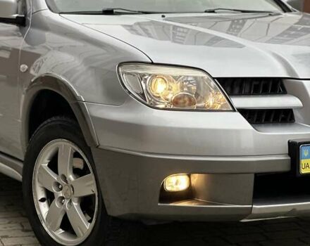 Сірий Міцубісі Аутлендер, об'ємом двигуна 2.4 л та пробігом 98 тис. км за 7199 $, фото 25 на Automoto.ua