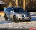 Сірий Міцубісі Аутлендер, об'ємом двигуна 2.4 л та пробігом 250 тис. км за 5600 $, фото 2 на Automoto.ua