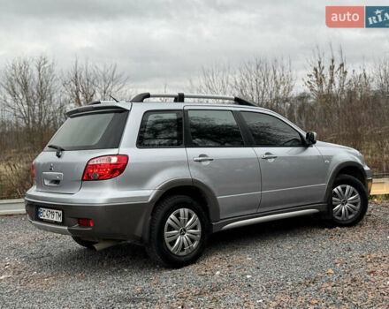 Серый Мицубиси Аутлендер, объемом двигателя 2.38 л и пробегом 204 тыс. км за 6990 $, фото 35 на Automoto.ua