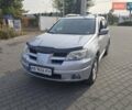 Серый Мицубиси Аутлендер, объемом двигателя 2.4 л и пробегом 243 тыс. км за 6999 $, фото 25 на Automoto.ua