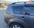 Серый Мицубиси Аутлендер, объемом двигателя 3 л и пробегом 320 тыс. км за 7700 $, фото 3 на Automoto.ua