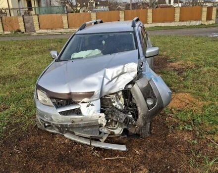 Серый Мицубиси Аутлендер, объемом двигателя 2 л и пробегом 190 тыс. км за 1600 $, фото 2 на Automoto.ua