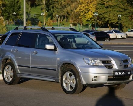 Серый Мицубиси Аутлендер, объемом двигателя 2.4 л и пробегом 200 тыс. км за 8950 $, фото 2 на Automoto.ua