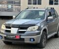 Серый Мицубиси Аутлендер, объемом двигателя 2.4 л и пробегом 298 тыс. км за 5590 $, фото 1 на Automoto.ua