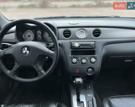 Серый Мицубиси Аутлендер, объемом двигателя 2.4 л и пробегом 264 тыс. км за 6300 $, фото 17 на Automoto.ua