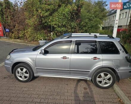 Серый Мицубиси Аутлендер, объемом двигателя 2.4 л и пробегом 243 тыс. км за 6999 $, фото 1 на Automoto.ua