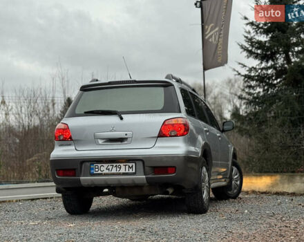 Серый Мицубиси Аутлендер, объемом двигателя 2.38 л и пробегом 204 тыс. км за 6990 $, фото 38 на Automoto.ua