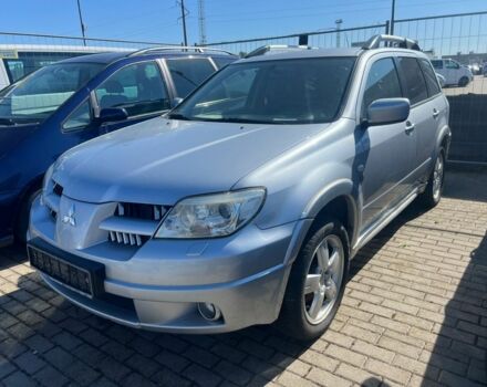 Серый Мицубиси Аутлендер, объемом двигателя 2.4 л и пробегом 220 тыс. км за 3369 $, фото 1 на Automoto.ua