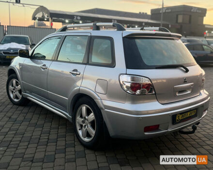 Серый Мицубиси Аутлендер, объемом двигателя 2.4 л и пробегом 231 тыс. км за 8100 $, фото 4 на Automoto.ua