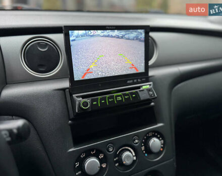 Серый Мицубиси Аутлендер, объемом двигателя 2.38 л и пробегом 204 тыс. км за 6990 $, фото 25 на Automoto.ua