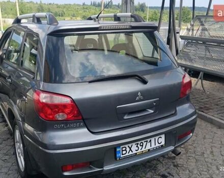 Серый Мицубиси Аутлендер, объемом двигателя 2.38 л и пробегом 600 тыс. км за 5700 $, фото 7 на Automoto.ua