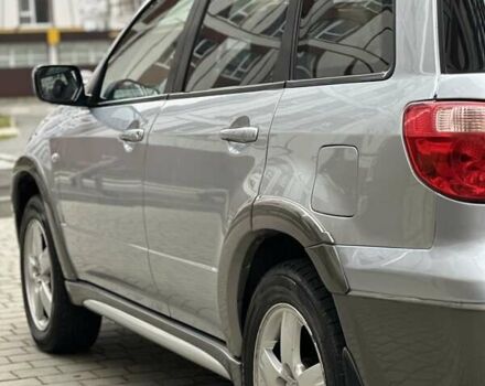 Сірий Міцубісі Аутлендер, об'ємом двигуна 2.4 л та пробігом 98 тис. км за 7199 $, фото 41 на Automoto.ua