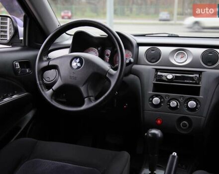 Серый Мицубиси Аутлендер, объемом двигателя 2.4 л и пробегом 171 тыс. км за 8200 $, фото 10 на Automoto.ua