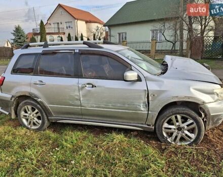 Серый Мицубиси Аутлендер, объемом двигателя 2 л и пробегом 190 тыс. км за 1600 $, фото 1 на Automoto.ua