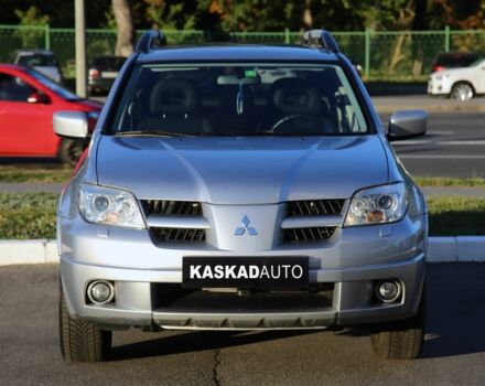 Серый Мицубиси Аутлендер, объемом двигателя 2.4 л и пробегом 200 тыс. км за 8950 $, фото 1 на Automoto.ua
