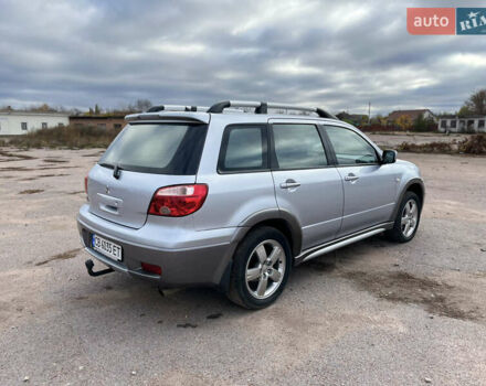 Серый Мицубиси Аутлендер, объемом двигателя 2.4 л и пробегом 264 тыс. км за 6300 $, фото 6 на Automoto.ua