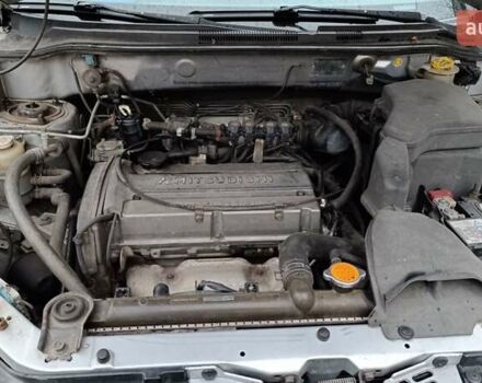 Сірий Міцубісі Аутлендер, об'ємом двигуна 2 л та пробігом 312 тис. км за 8300 $, фото 3 на Automoto.ua