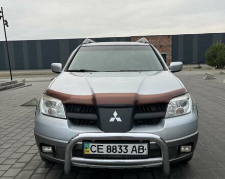 Серый Мицубиси Аутлендер, объемом двигателя 2.38 л и пробегом 180 тыс. км за 6000 $, фото 14 на Automoto.ua