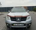 Серый Мицубиси Аутлендер, объемом двигателя 2.38 л и пробегом 180 тыс. км за 6000 $, фото 14 на Automoto.ua