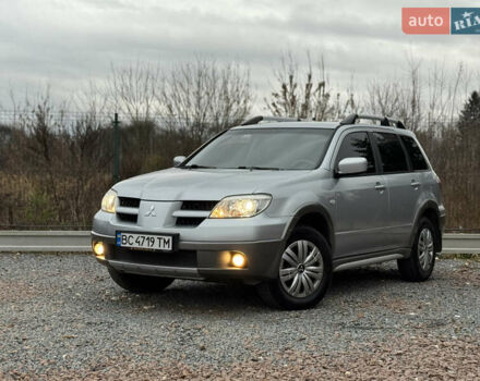 Серый Мицубиси Аутлендер, объемом двигателя 2.38 л и пробегом 204 тыс. км за 6990 $, фото 40 на Automoto.ua