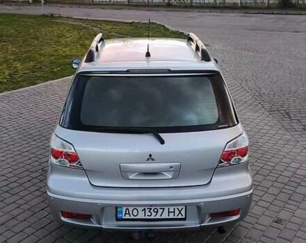 Серый Мицубиси Аутлендер, объемом двигателя 2.38 л и пробегом 228 тыс. км за 7900 $, фото 16 на Automoto.ua