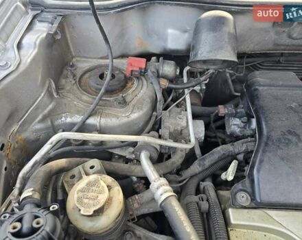 Серый Мицубиси Аутлендер, объемом двигателя 2.4 л и пробегом 243 тыс. км за 6999 $, фото 6 на Automoto.ua