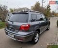 Серый Мицубиси Аутлендер, объемом двигателя 2 л и пробегом 240 тыс. км за 6300 $, фото 5 на Automoto.ua
