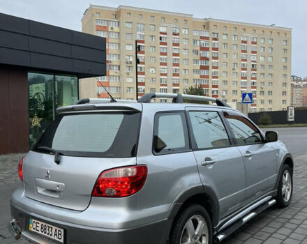 Серый Мицубиси Аутлендер, объемом двигателя 2.38 л и пробегом 180 тыс. км за 6000 $, фото 3 на Automoto.ua