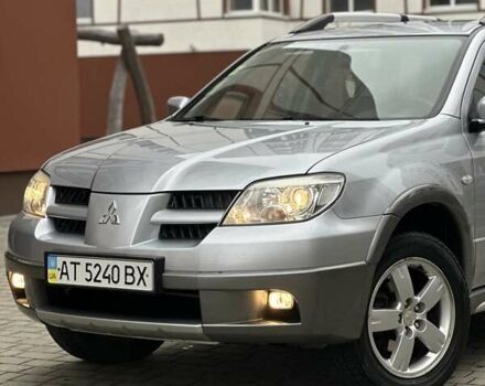 Сірий Міцубісі Аутлендер, об'ємом двигуна 2.4 л та пробігом 98 тис. км за 7199 $, фото 3 на Automoto.ua