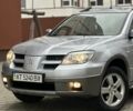 Сірий Міцубісі Аутлендер, об'ємом двигуна 2.4 л та пробігом 98 тис. км за 7199 $, фото 3 на Automoto.ua