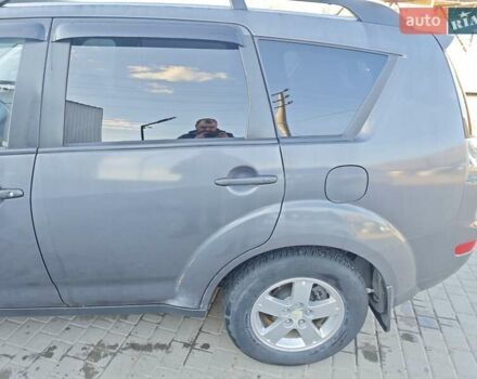 Серый Мицубиси Аутлендер, объемом двигателя 3 л и пробегом 320 тыс. км за 7700 $, фото 13 на Automoto.ua