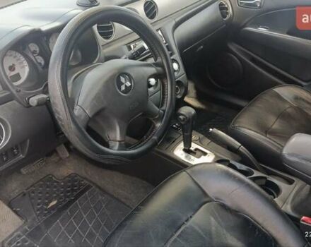 Серый Мицубиси Аутлендер, объемом двигателя 2.38 л и пробегом 600 тыс. км за 5700 $, фото 3 на Automoto.ua