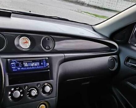 Серый Мицубиси Аутлендер, объемом двигателя 2.38 л и пробегом 228 тыс. км за 7900 $, фото 2 на Automoto.ua
